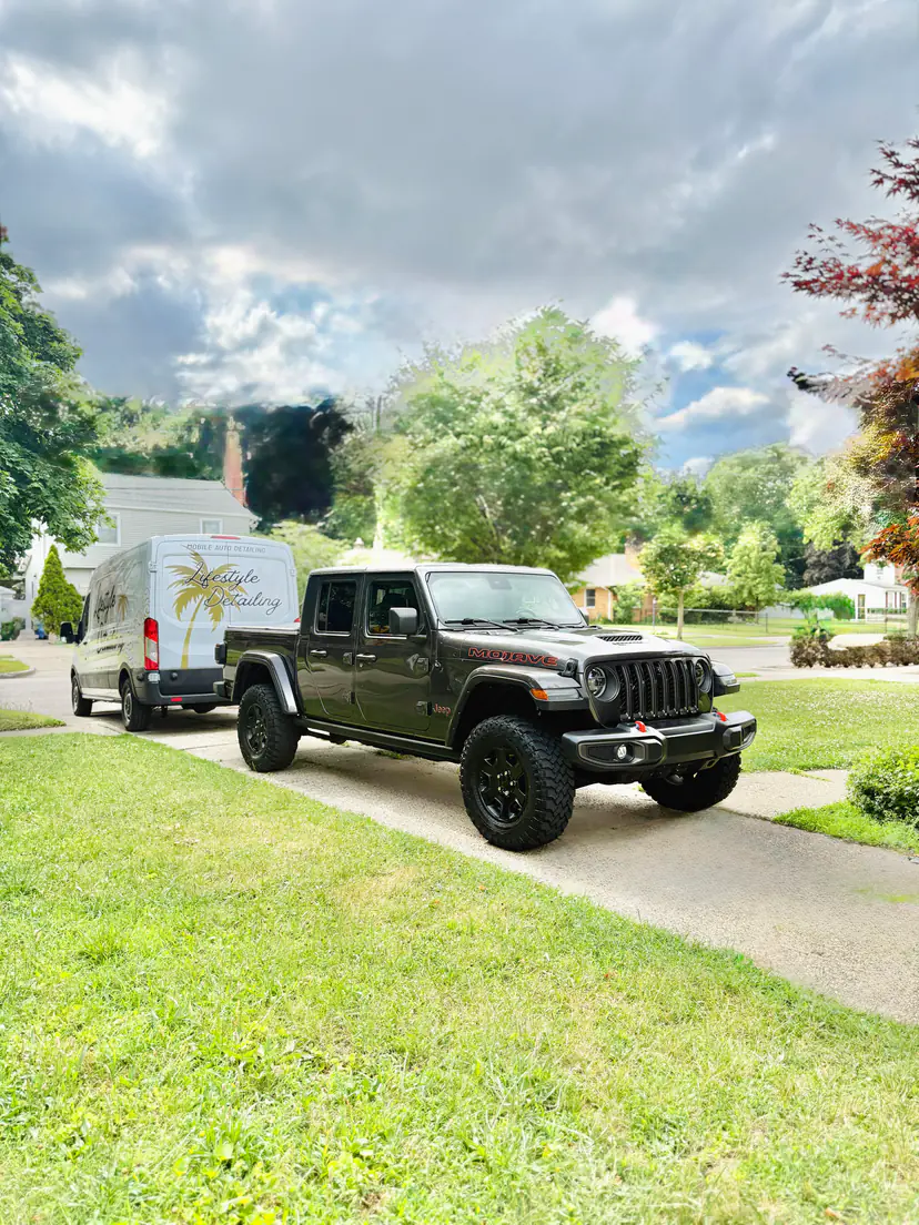 Jeep Gladiator after an exterior detail beside the Lifestyle Detailing van