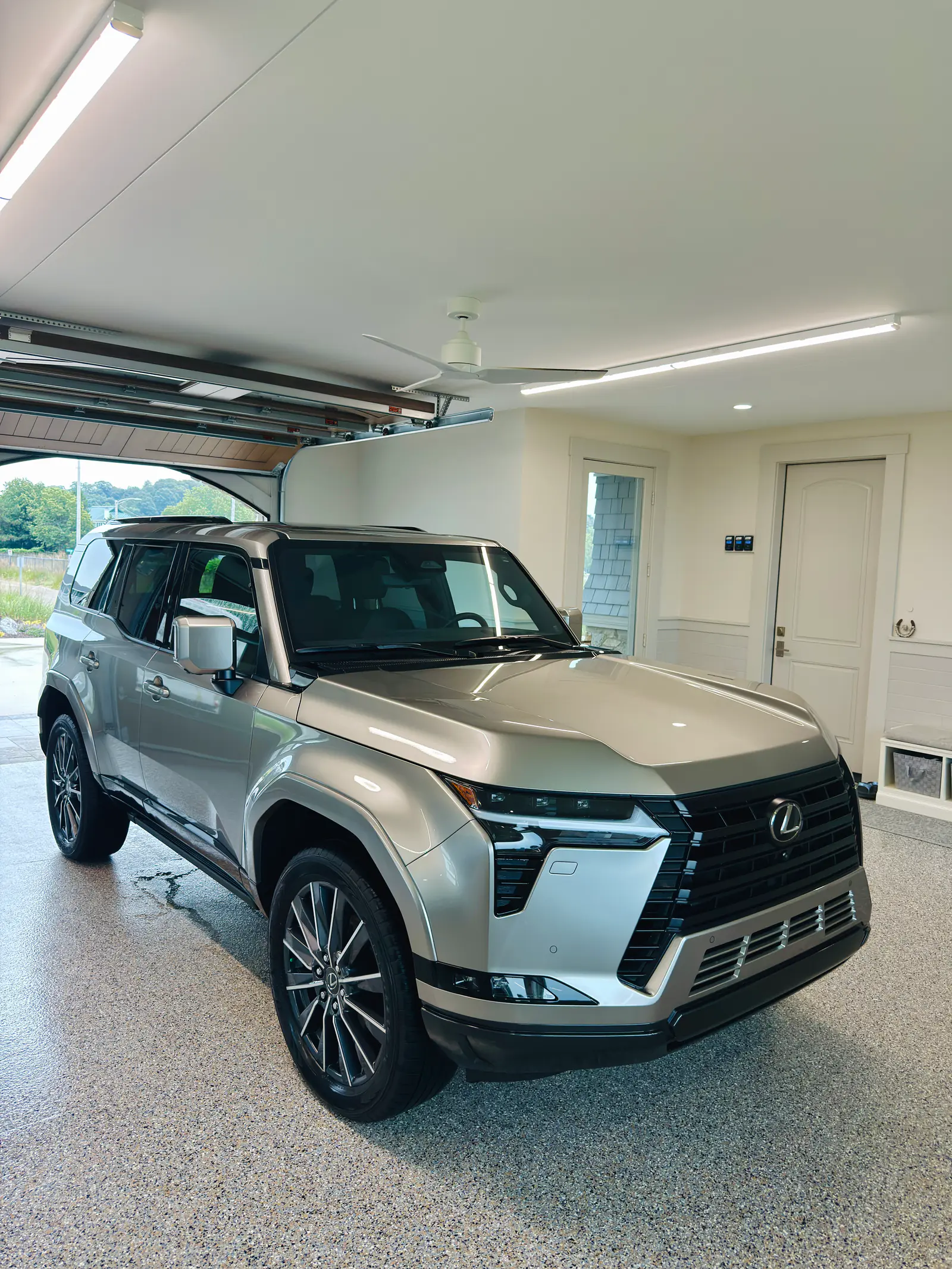 Lexus GX 550 after an exterior detail, parked in a spotless home garage