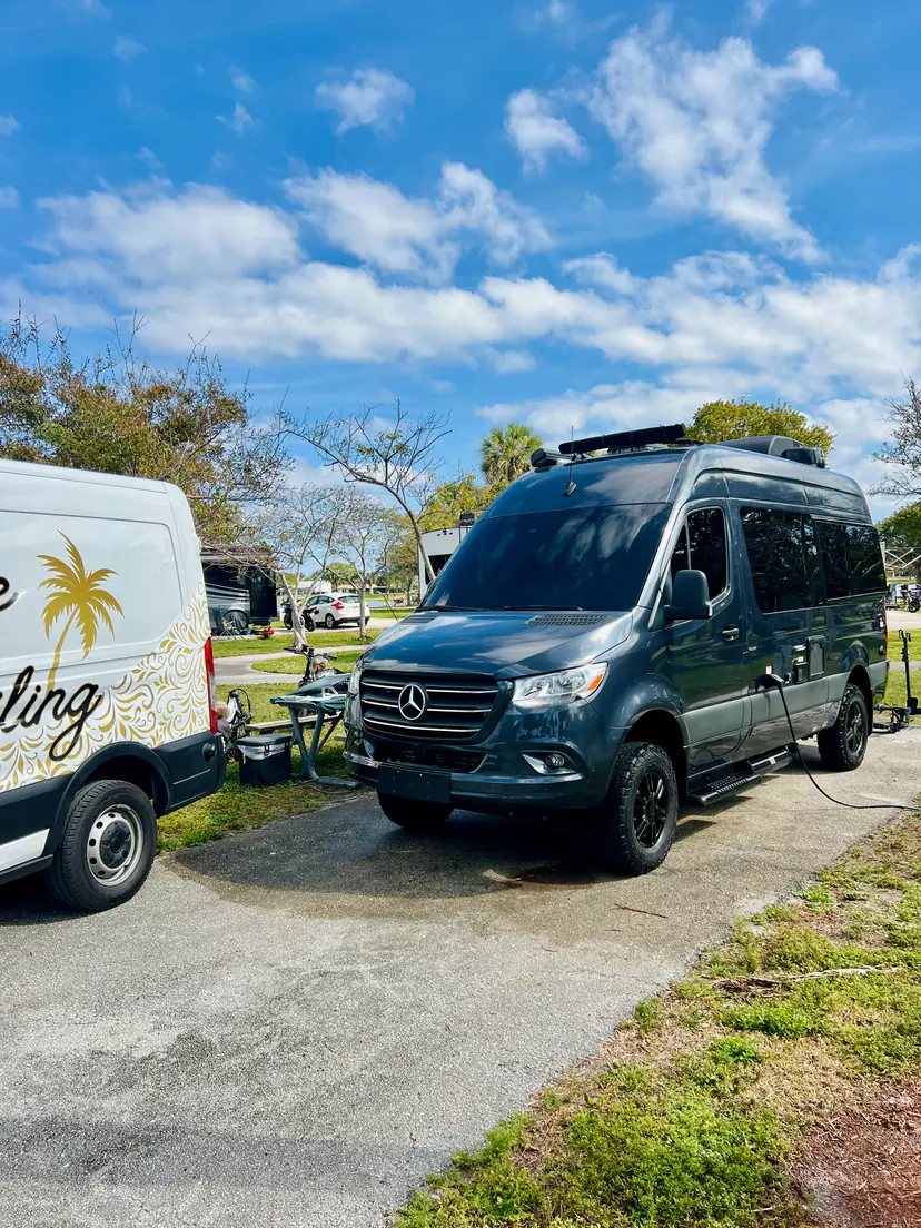Mercedes Sprinter camper van after an exterior detail beside the Lifestyle Detailing van