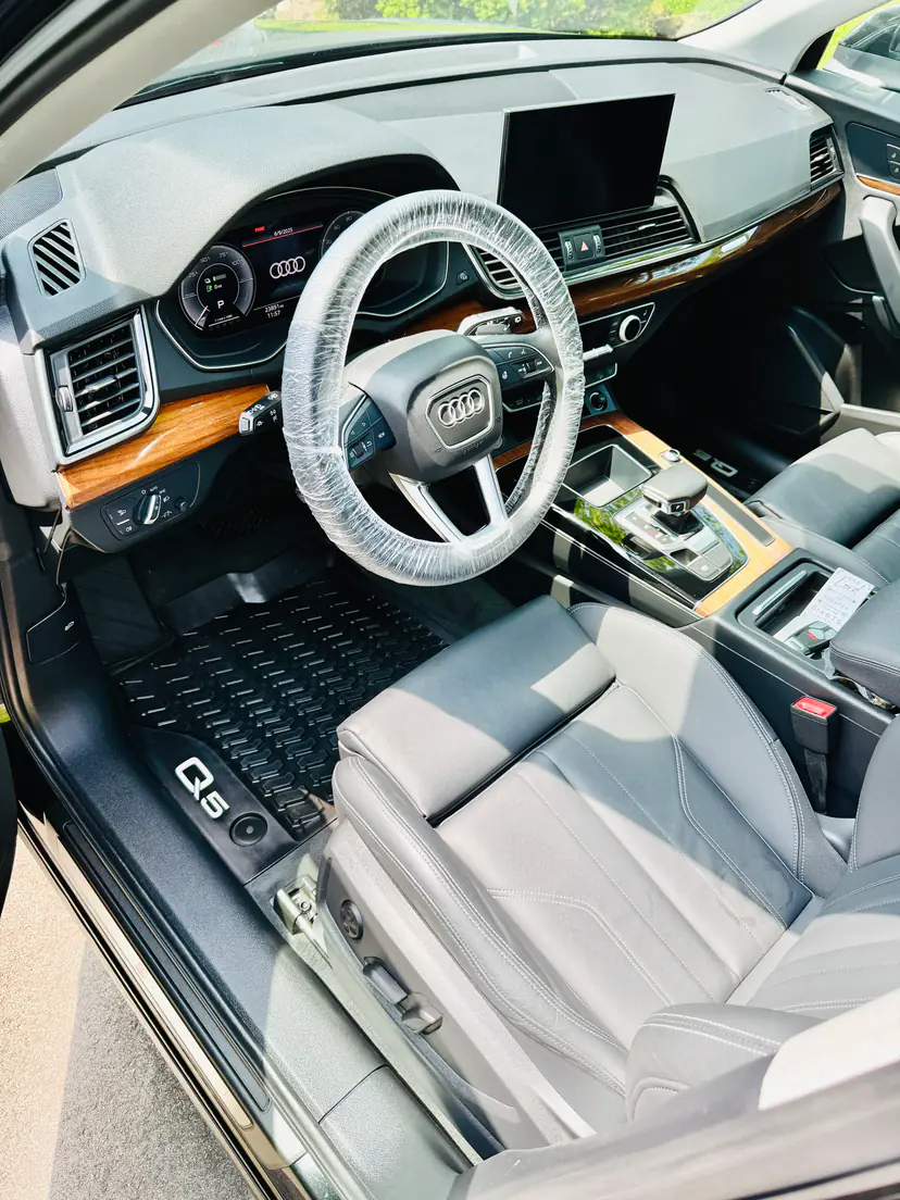 Audi Q5 driver's seat and dash after a mobile interior detail in Grand Rapids Township, Michigan